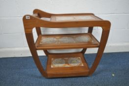 A MID CENTURY TEAK THREE TIER TILE TOP TEAK TROLLEY, with a shaped frame and handle, length 80cm x
