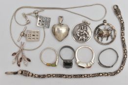 A SMALL BAG OF JEWELLERY, to include a St. Christopher pendant stamped 925, an openwork bull