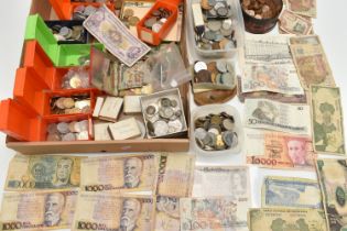 A CARDBOARD TRAY OF WORLD COINS AND DISTRESSED BANKNOTES, to include a small box of mixed silver