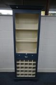 A NEPTUNE BLAKENEY BLUE BOOKCASE/WINE RACK, with a single drawer, on bracket feet, width 82cm x
