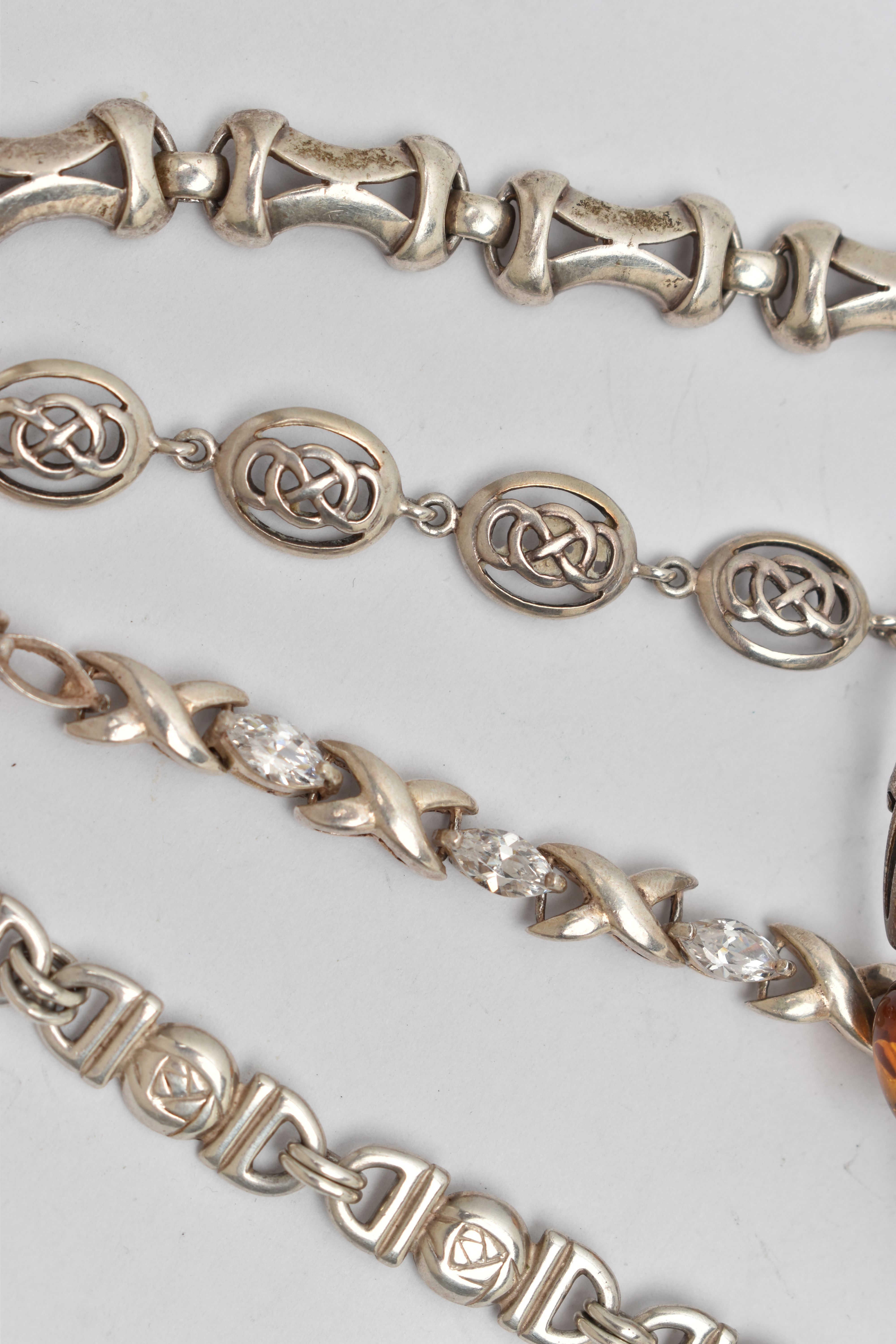 FIVE BRACELETS, to include a white metal hinged bangle set with amber cabochons, stamped 925, a - Image 3 of 4