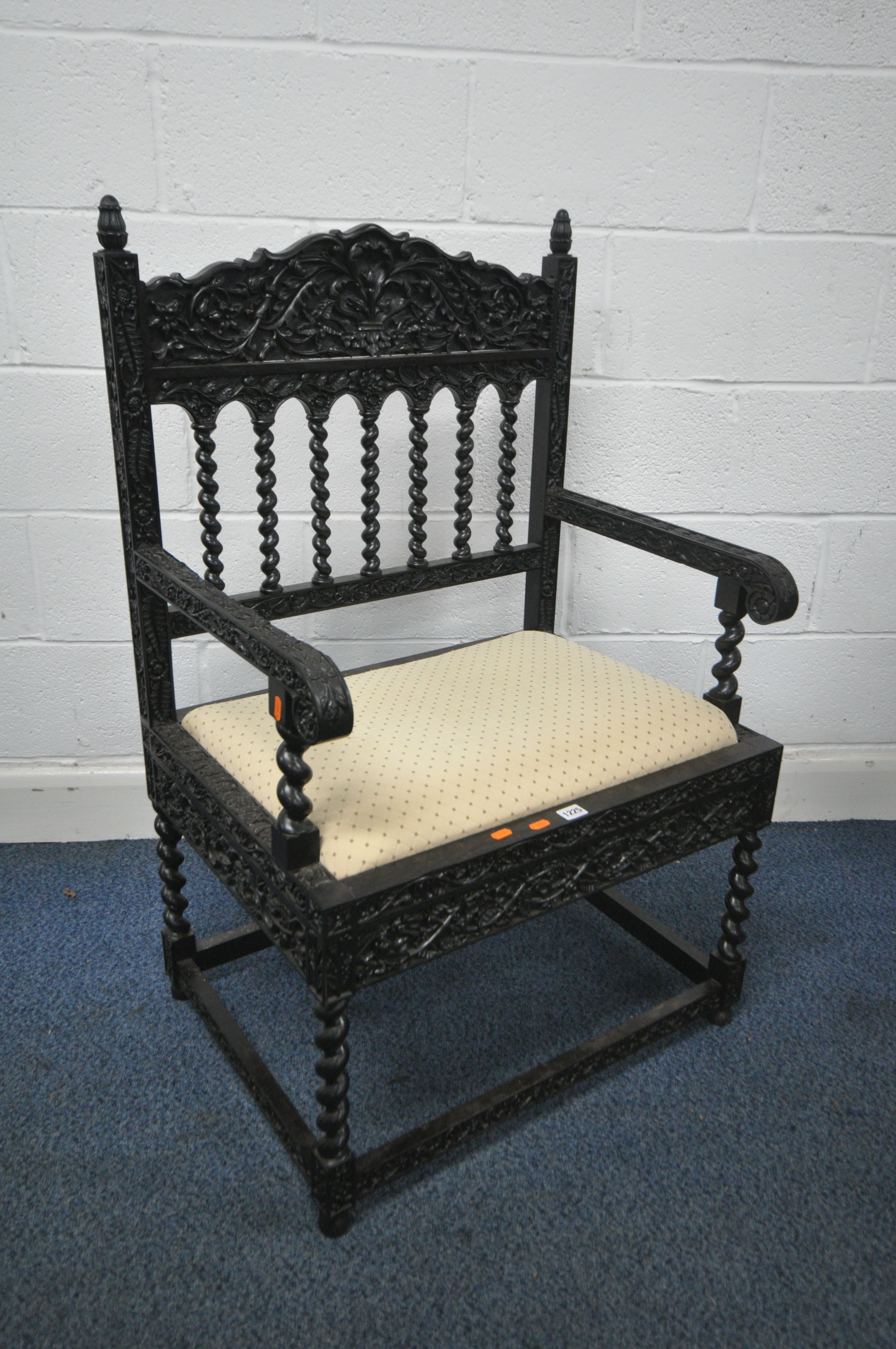 A LATE 19TH / EARLY 20TH CENTURY HEAVY EXOTIC HARDWOOD ANGLO CHINESE OPEN ARMCHAIR, ornately