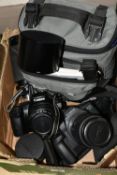 A BOX OF CAMERAS AND PHOTOGRAPHIC EQUIPMENT, to include a Canon EOS 1000F camera fitted with an f1.8