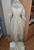 A BESPOKE LATE 19TH CENTURY VICTORIAN SILK AND LACE WEDDING DRESS WITH ACCESSORIES, made for the