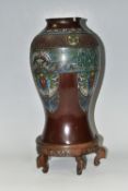 AN EARLY 20TH CENTURY BRONZE AND CHAMPLEVE BALUSTER VASE, patinated finish, height 36cm, together