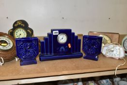 A GROUP OF CLOCKS AND BAROMETERS, comprising a Digoin Sarreguemines Art Deco ceramic clock garniture