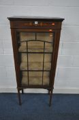 AN EDWARDIAN MAHOGANY AND INLAID DISPLAY CABINET, the single astragal glazed door enclosing two