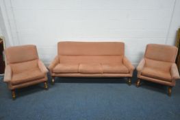 A MID CENTURY SCANDINAVIAN / DANISH THREE PIECE LOUNGE SUITE, with low seat and armrests,