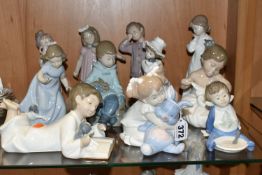 ELEVEN NAO FIGURES OF CHILDREN, to include a boy reading to a puppy, a girl with a toy rabbit, a