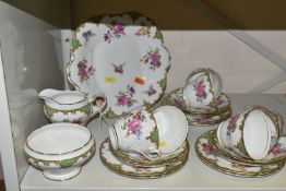 AN AYNSLEY FLORAL PATTERN PART TEA SET, comprising of six cups, saucers and side plates, twin