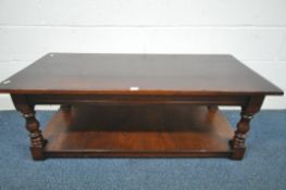 A TITCHMARSH AND GOODWIN STYLE SOLID OAK COFFEE TABLE, on turned legs, united by an undershelf,