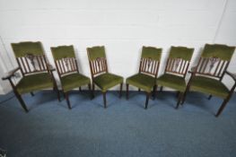 A SET OF SIX OAK ARTS AND CRAFTS CHAIRS, including two carvers, with green upholstery on turned