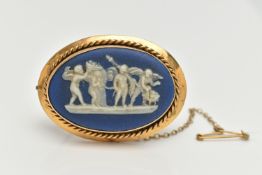 A 'WEDGWOOD' CAMEO BROOCH, blue wedgwood cameo, set in yellow metal with a rope detail surround,