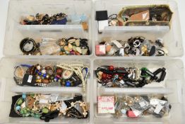 FOUR STACKING BOXES OF COSTUME JEWELLERY, to include beaded necklaces, bangles, earrings, and rings,