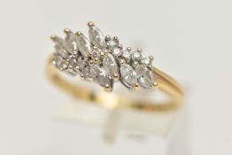 AN 18CT GOLD DIAMOND CLUSTER RING, cluster set with marquise cut and round brilliant cut diamonds,