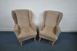 A PAIR OF OATMEAL UPHOLSTERED WING BACK ARMCHAIRS, width 70cm x depth 71cm x height 109cm (condition