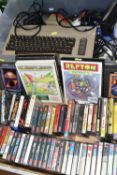 COMMODORE 64 AND A QUANTITY OF GAMES, games include but are not limited to Konami's Coin Op Hits,