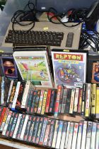 COMMODORE 64 AND A QUANTITY OF GAMES, games include but are not limited to Konami's Coin Op Hits,