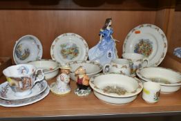 A ROYAL DOULTON FIGURE OF THE YEAR AND A COLLECTION OF 'BUNNYKINS' DINNERWARE, comprising a