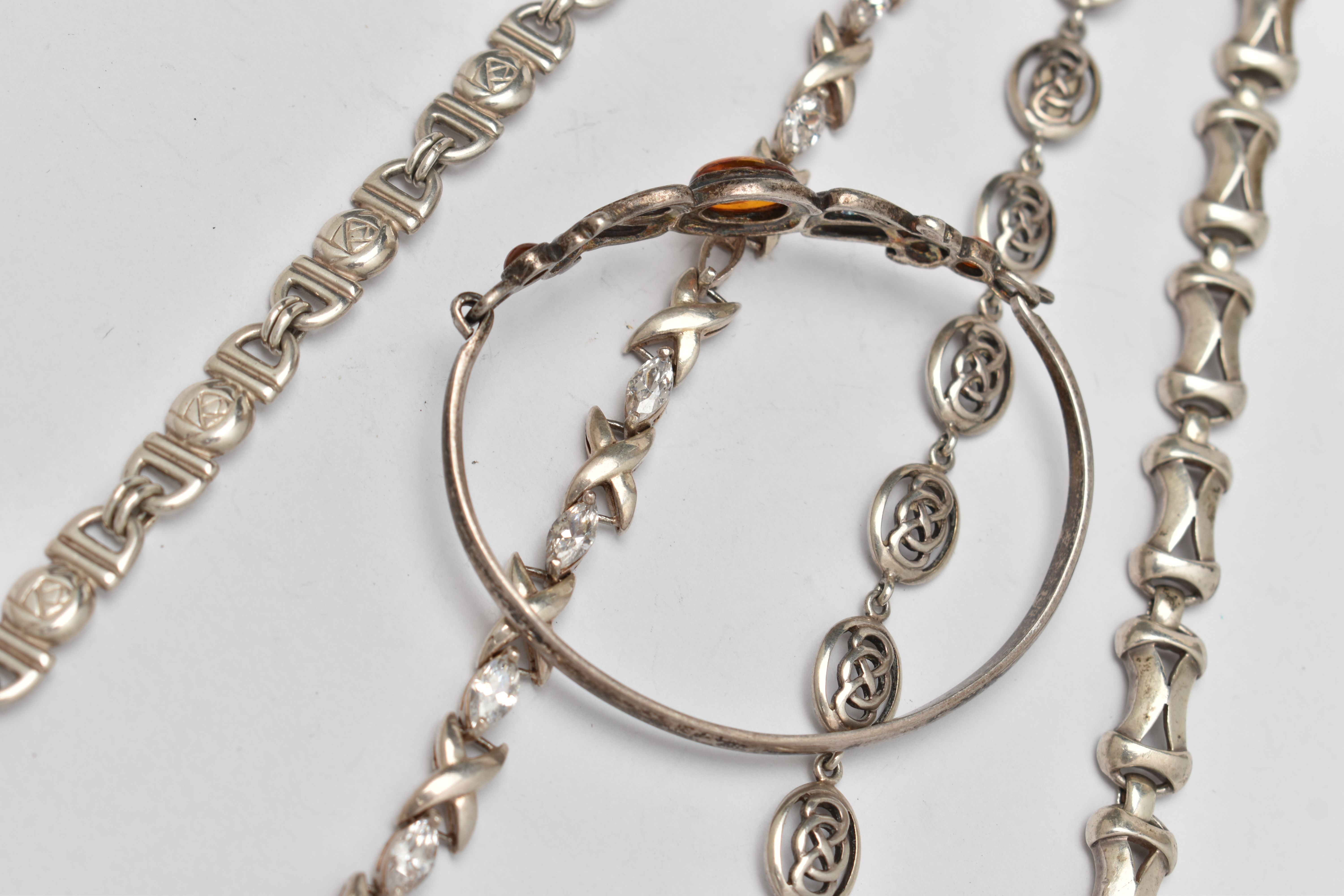 FIVE BRACELETS, to include a white metal hinged bangle set with amber cabochons, stamped 925, a - Image 4 of 4