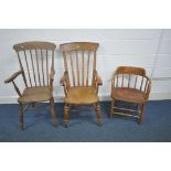 A 19TH CENTURY ELM AND BEECH FARMHOUSE WINDSOR ARMCHAIR, with spindle supported armrests, on