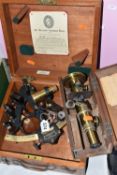 A CASED SEXTANT AND MICROSCOPE, comprising a Heath & Co 'Hezzanith' copper, brass and textured