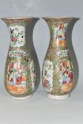 A NEAR PAIR OF LATE 19TH CENTURY CHINESE CANTON FAMILLE ROSE PORCELAIN BALUSTER VASES, with flared