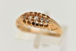 AN EARLY 20TH CENTURY 18CT GOLD DIAMOND BOAT RING, set with a row of five rose cut diamonds, to a