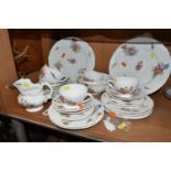 A GROUP OF COALPORT SEVRES GROUP FLORAL SPRAYS TEAWARE, Y3521 embossed floral pattern, scalloped