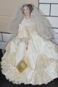 A FRANKLIN HEIRLOOM PORCELAIN DOLL, 1993 EDITION VICTORIA AND ALBERT BRIDE, HEIGHT 54CM (1) (