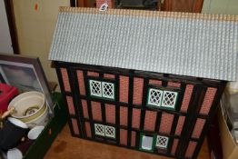 A MODERN KIT BUILT WOODEN DOLLS HOUSE, front opening to reveal four rooms over two floors,