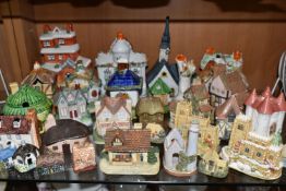 A COLLECTION OF MINIATURE BUILDINGS, more than thirty mainly ceramic pieces, to include a Coalport
