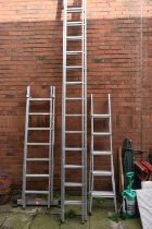 A YOUNGMAN 4.0M ALUMINIUM DOUBLE EXTENSION LADDER, along with a Youngman 100 pro-deck ladder and a