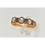 A VICTORIAN 15CT GOLD PEARL RING, designed with a row of three split pearls, each interspaced with