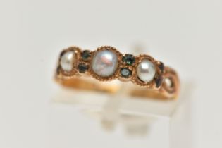 A VICTORIAN 15CT GOLD PEARL RING, designed with a row of three split pearls, each interspaced with