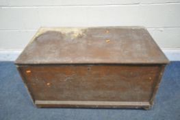 A VINTAGE PINE TOOL CHEST, with a hinged lid, on castors, width 96cm x depth 54cm x height 52cm (
