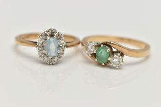 TWO 9CT GOLD GEM SET RINGS, the first an oval cluster, set with an oval cut aquamarine, eight claw