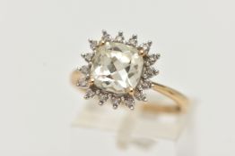 A 9CT GOLD GEM SET RING, a square cut light yellow quartz, set with a halo of single cut diamonds,