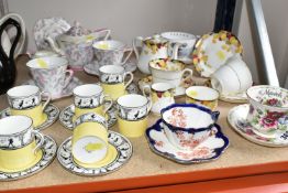A GROUP OF TEA AND COFFEE WARE, comprising six Foley China E. Brain & Co. coffee cans and five