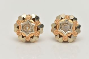 A PAIR OF BI-COLOUR SPINEL EARRINGS, each earring of a circular open work dome, set with a central