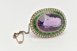 A YELLOW METAL GEM AND ENAMEL BROOCH, of an oval form, set with a large oval cut amethyst, within