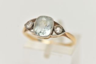 AN AQUAMARINE AND DIAMOND RING, set with a central cushion cut aquamarine, in a milgrain setting,