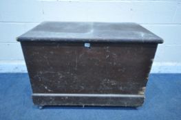 A VINTAGE PINE TOOL CHEST, with twin metal handles, on castors, width 94cm x depth 55cm x height