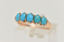 A YELLOW METAL GEM SET FIVE STONE RING, set with five oval turquoise cabochons, claw set, to the