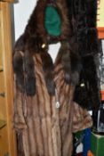 A GROUP OF VINTAGE FURS, comprising a 1940's brown fur coat, fur stole and hat, a dark brown full
