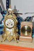A FRENCH STYLE GILT METAL MANTEL CLOCK, with hand painted porcelain dial and front panel, eight