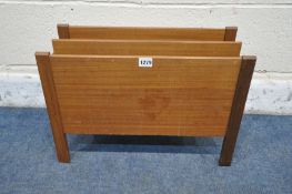 A MID CENTURY TEAK CANTERBURY, possibly Guy Rogers, with two sections, width 51cm x depth 31cm x