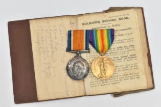 TWO WWI MEDALS AND A SOLDIERS SERVICE BOOK, two medals awarded to 4612 PTE. W. DEACON. W. YORK. R.