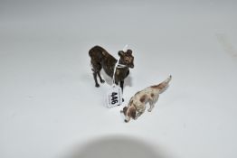 TWO SMALL BRONZE FIGURES OF DOGS, comprising a bronze sculpture of a standing greyhound, height