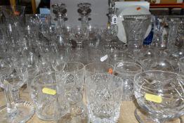 A QUANTITY OF CUT CRYSTAL AND GLASSWARE, comprising four decanters, five vases, two celery vases,